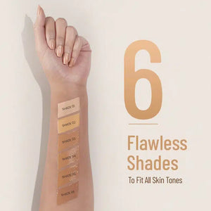 Arm swatched with six flawless foundation shades ranging from light to deep on neutral background