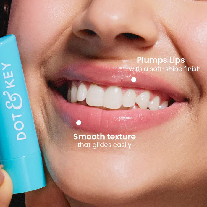 Dot & Key Barrier Repair Hydrating Tinted Lip Balm in Blueberry Bliss with SPF 50, showing smooth, tinted lip balm texture.